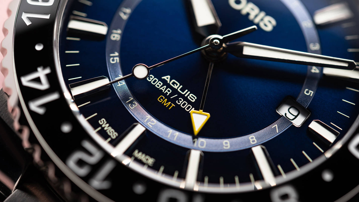 Aquis GMT Date 01 798 7754 4135-07 8 24 05PEB