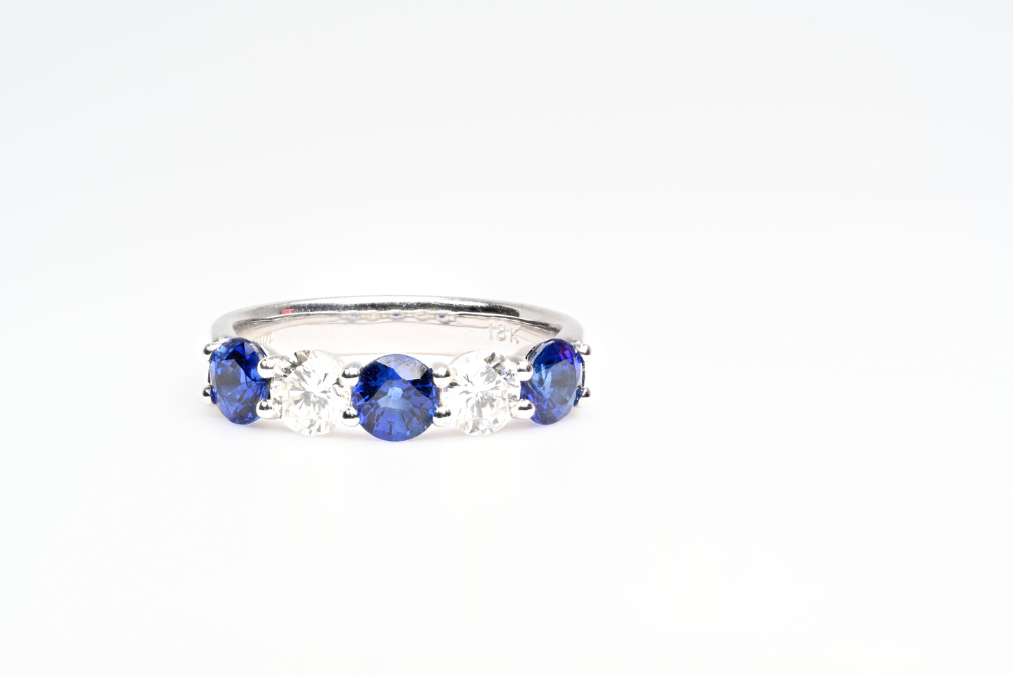 Diamond and sapphires ring
