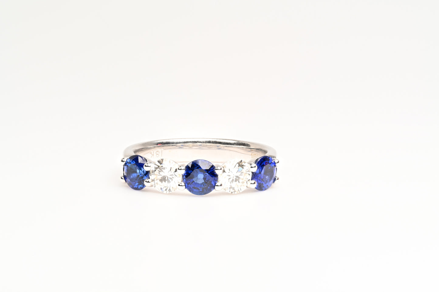 Diamond and sapphires ring