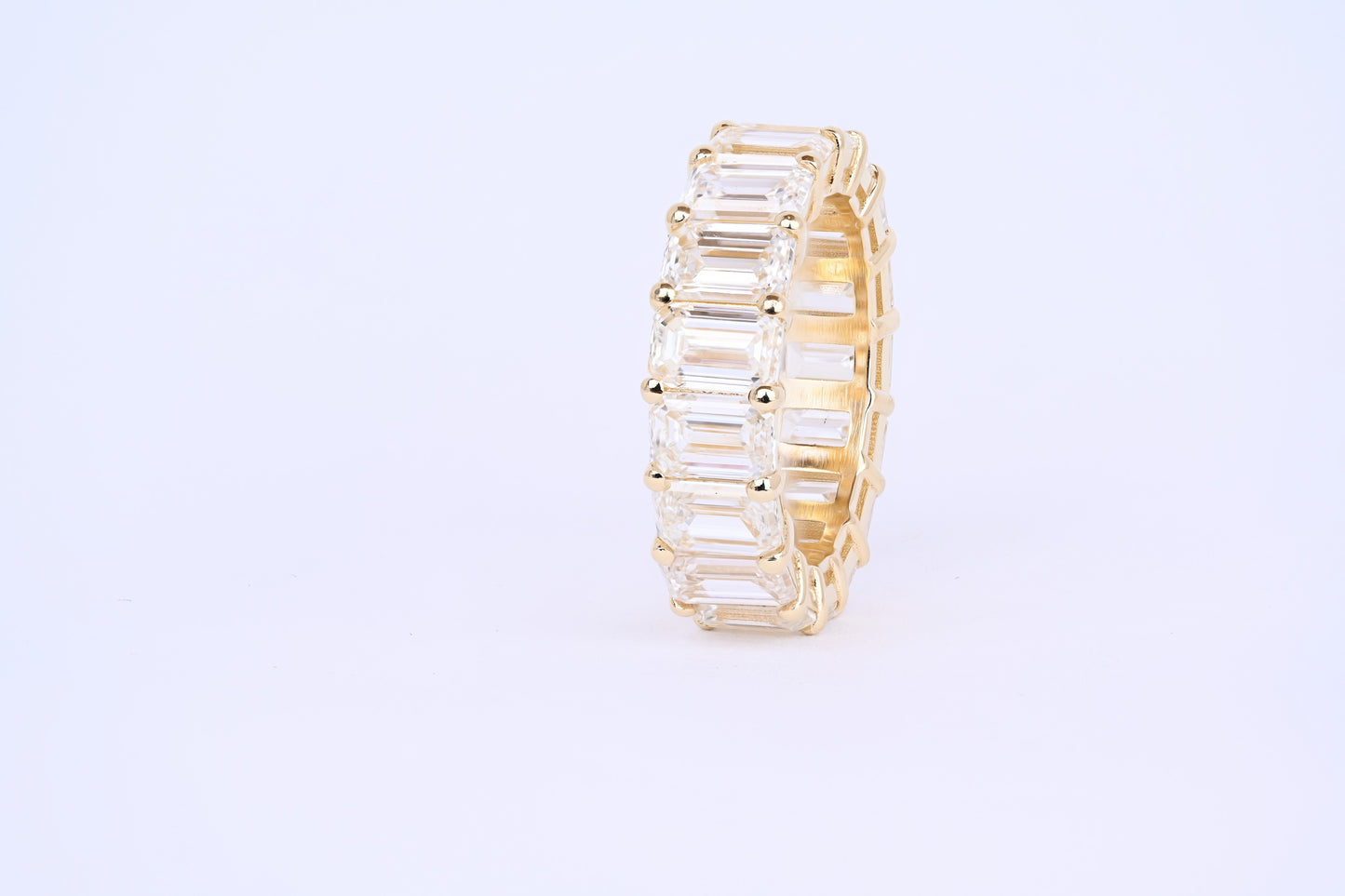 8.6 ctw emerald cut eternity ring