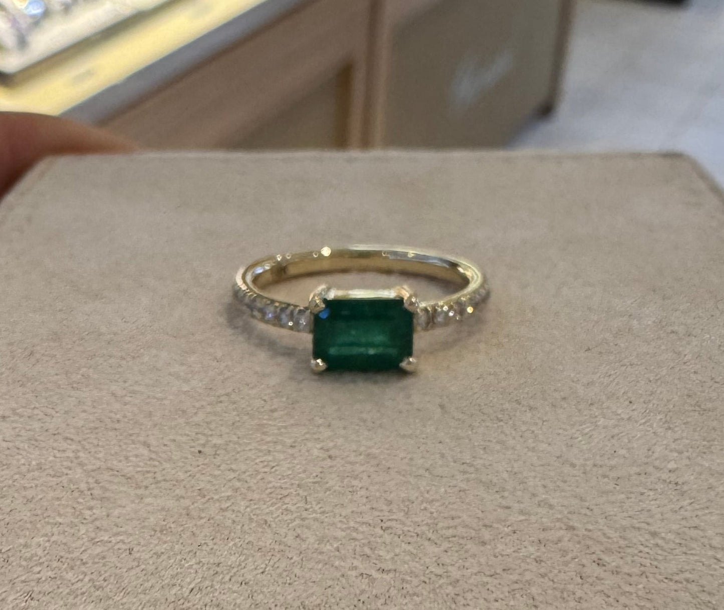 East-West Emerald and Diamond Ring